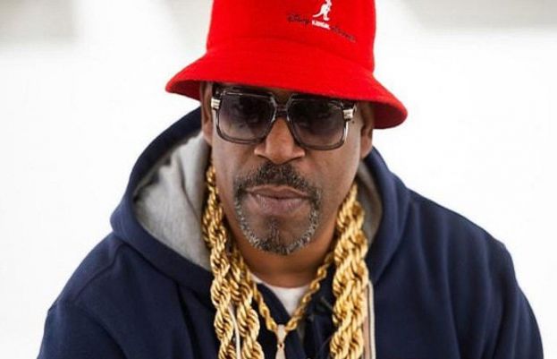 Curtis Fisher, aka Grandmaster Caz, still proudly wears his piles of blingy chains. 