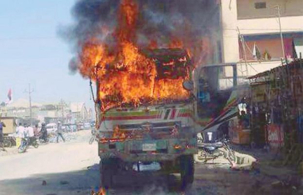 A dumper truck set on fire in Karachi