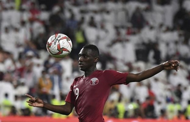 Qatar's forward Almoez Ali eyes with ball during the AFC Asian Cup semifinal soccer match between United Arab Emirates and Qatar at Mohammed Bin Zayed Stadium in Abu Dhabi on Jan 29.